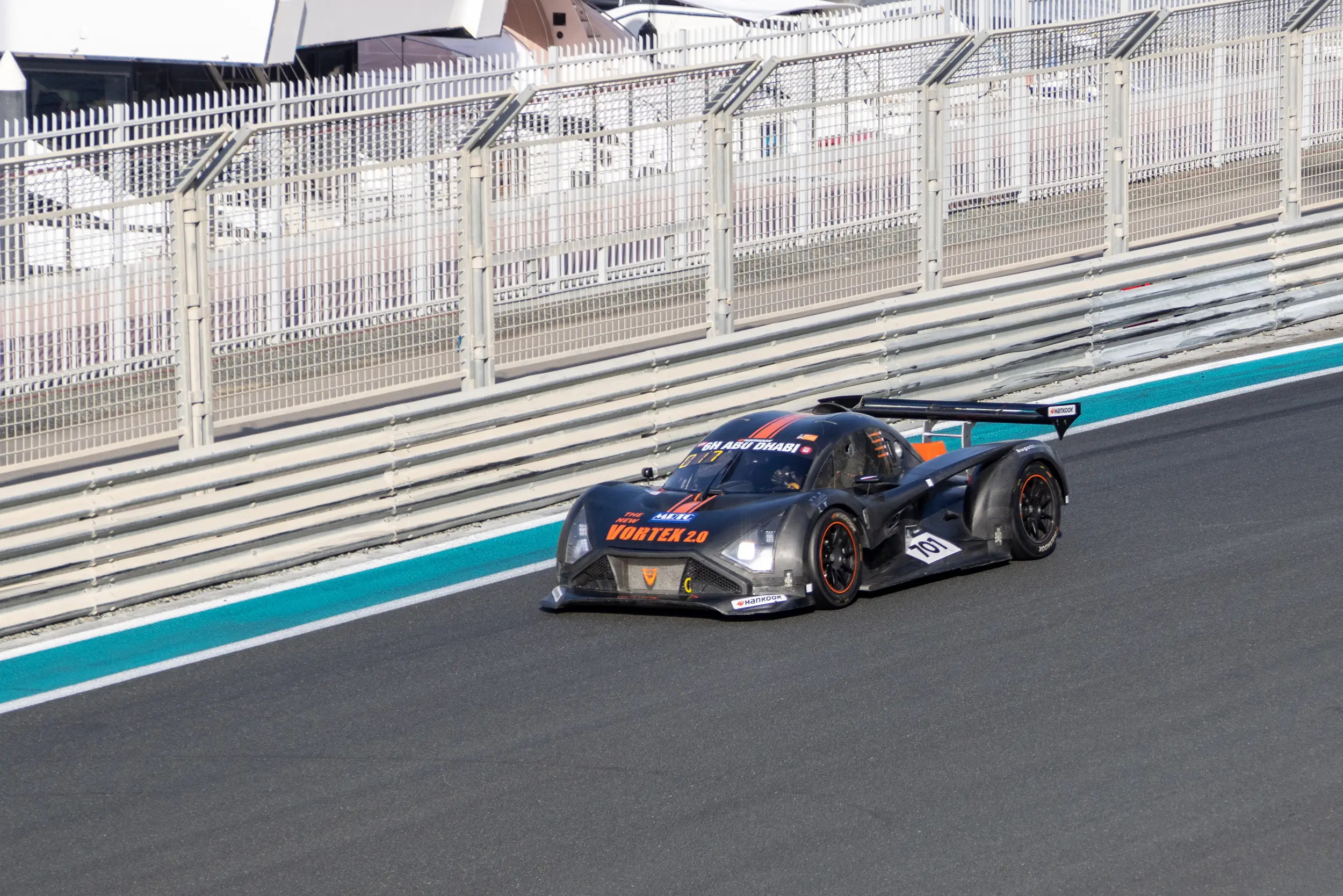 Race car on circuit — motorsport event photography