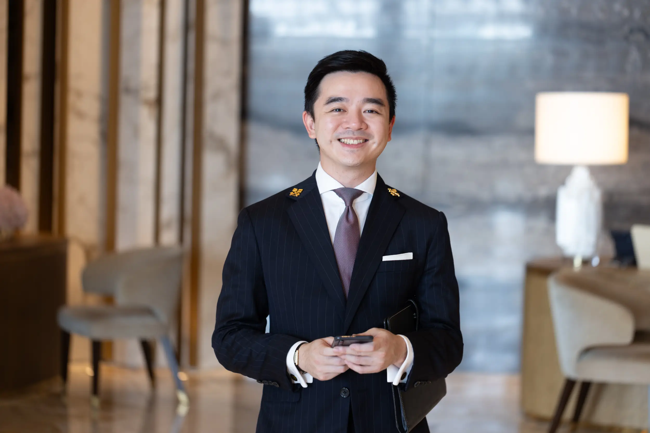 Executive portrait in luxury hotel lobby