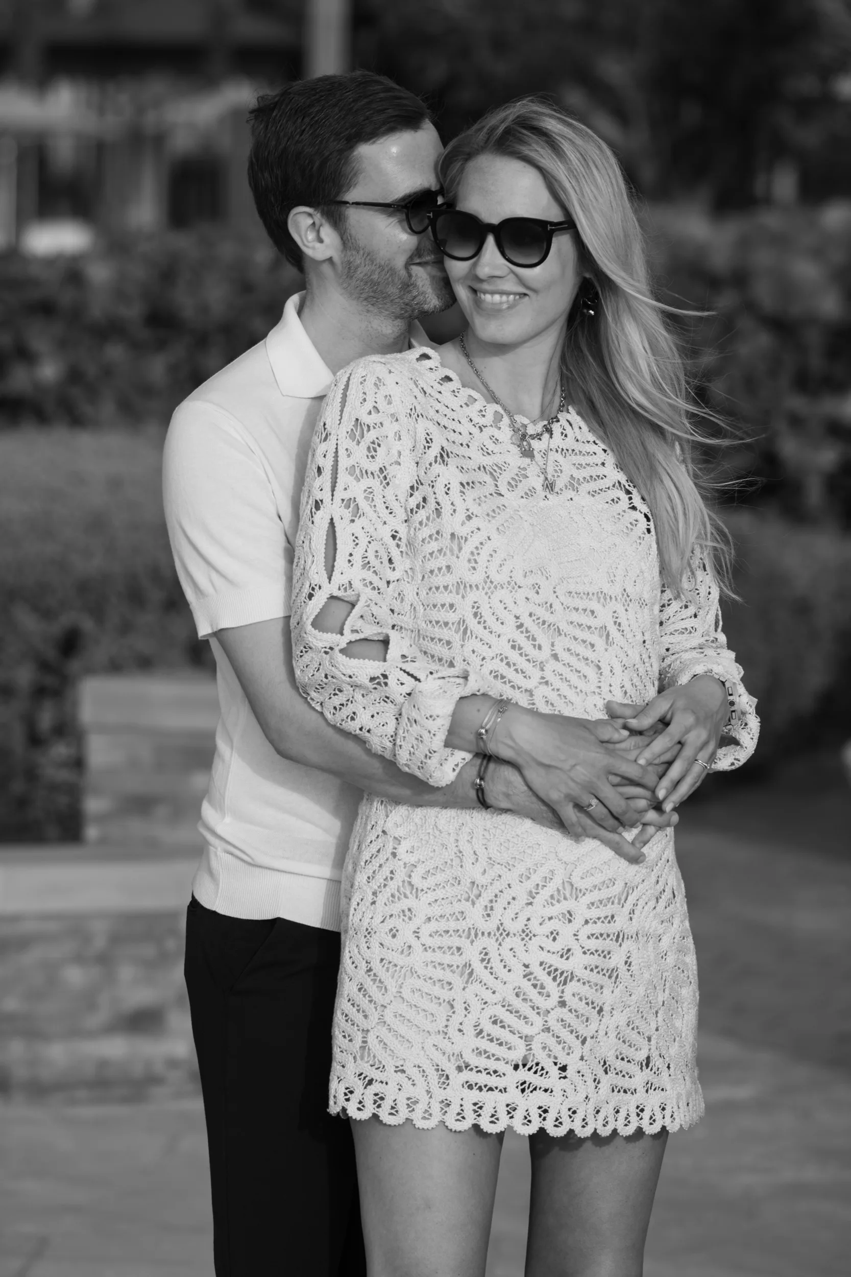 Private couple portrait — black and white embrace