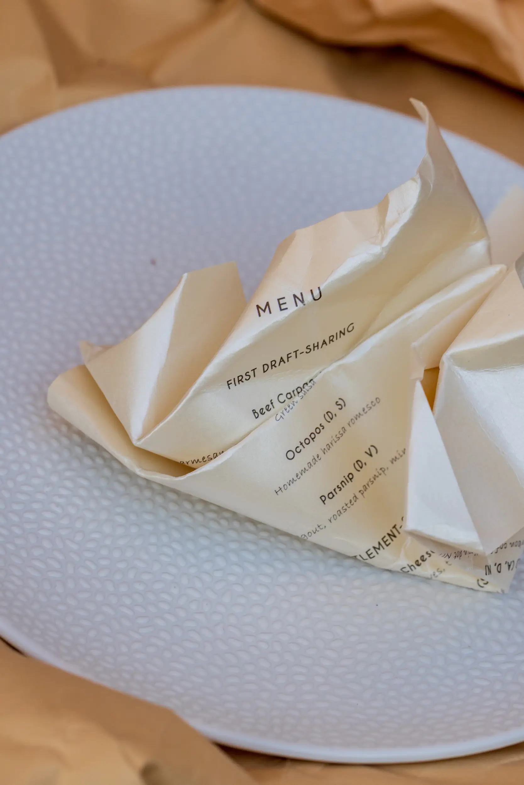 Menu origami — private dining detail photography
